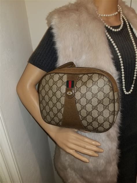 vintage gucci wristlet|clutch gucci original.